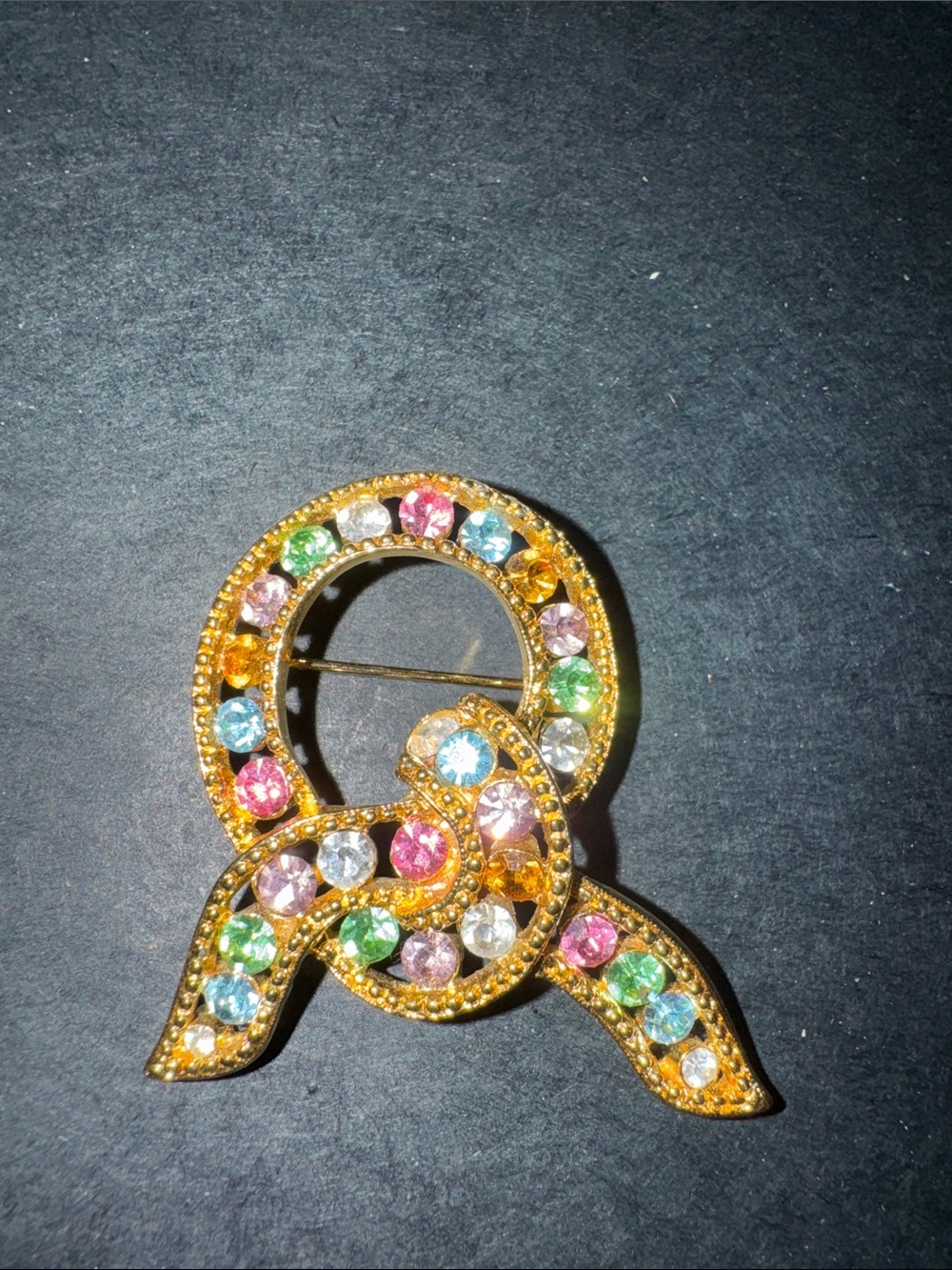 Vintage Joan Rivers lovers knot multi color rhinestone brooch signed JR